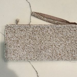 Tan beaded clutch